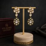 Aveline green Meenakari Polki drop earrings with gold finish