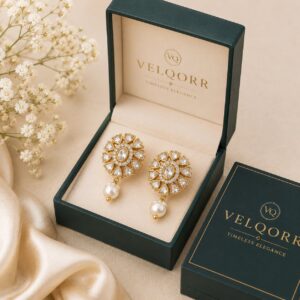 VELQORR Seraphine Pearl Bloom drop earrings with white stones and pearl drop in gold finish.
