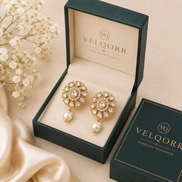 VELQORR Seraphine Pearl Bloom drop earrings with white stones and pearl drop in gold finish.