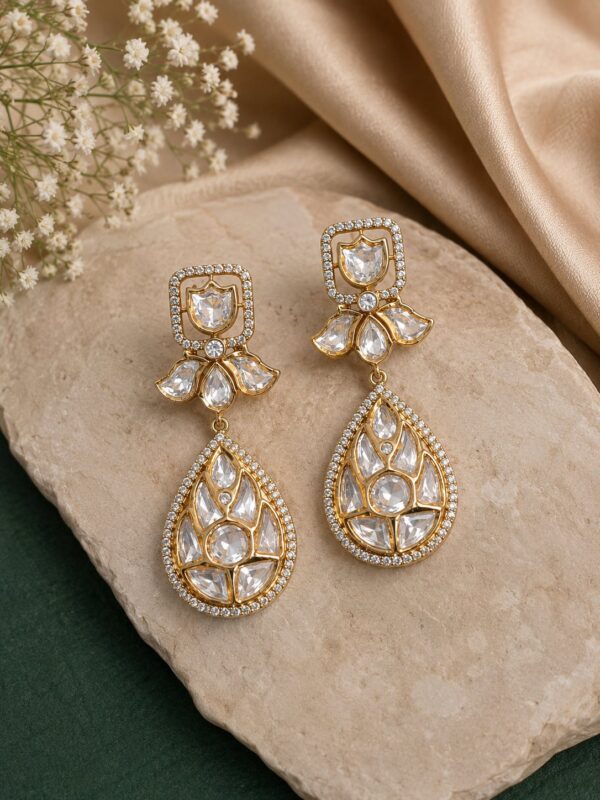 White teardrop kundan statement earrings with premium gold-plated finish by VELQORR.