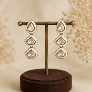 Veda Ivory Polki Statement Earrings featuring premium Polki stones with ivory enamel finish by VELQORR.